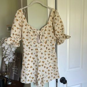 Flowered romper size small